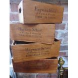 A set of four modern Hogwarts storage boxes
