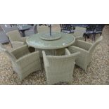 A Bramblecrest Cotswold 140cm round table with lazy susan, six armchairs,