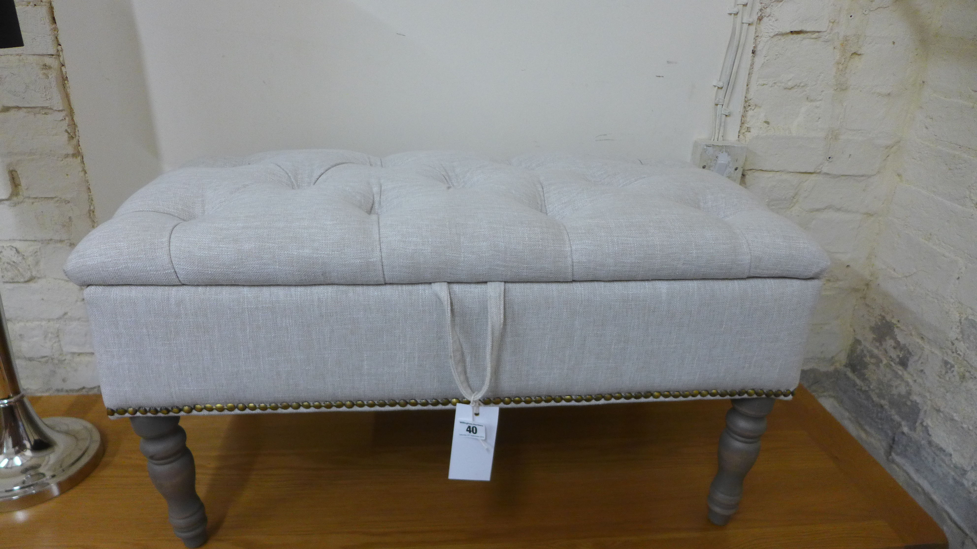 A good quality new upholstered ottoman/stool