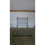 A Victorian brass and iron 4'6" double bedstead 6'6 long Condition report: In good condition