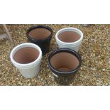 Four assorted glazed pots - Diameter 26cm