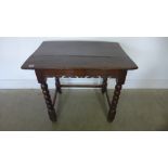 An 18th century oak side table with a decorative frieze - missing a stretcher - Height 68cm x 80cm