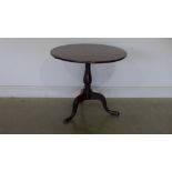 A George III mahogany tripod tilt top table on single pedestal - 78cm x 69cm