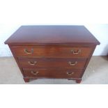 An Edwardian mahogany three drawer chest - Height 75cm x 92cm x 49cm