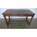 An 18th century fruitwood refectory table with a drawer on turned supports - Height 78cm x 146cm x