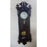 A 19th century single weight Vienna wall clock