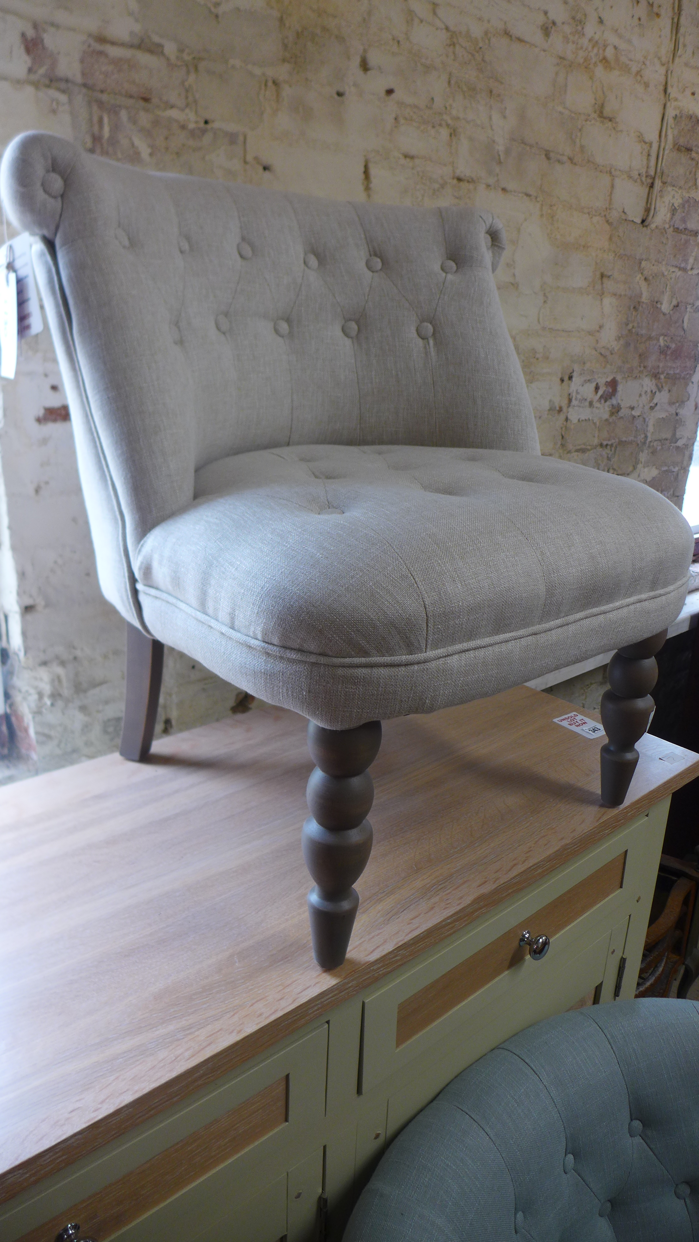 A new good quality upholstered bedroom chair