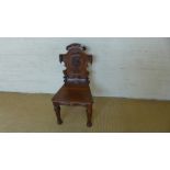 A 19th century oak Hall chairs with the Onslow Crest