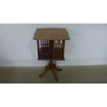 An Edwardian mahogany revolving bookcase - Height 72cm x 48cm x 48cm