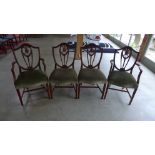 A set of four mahogany framed shield back dining chairs 2 + 2 with carved wheat supports,