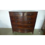 A 19th century mahogany bowfronted chest with two short over four long drawers on splayed bracket