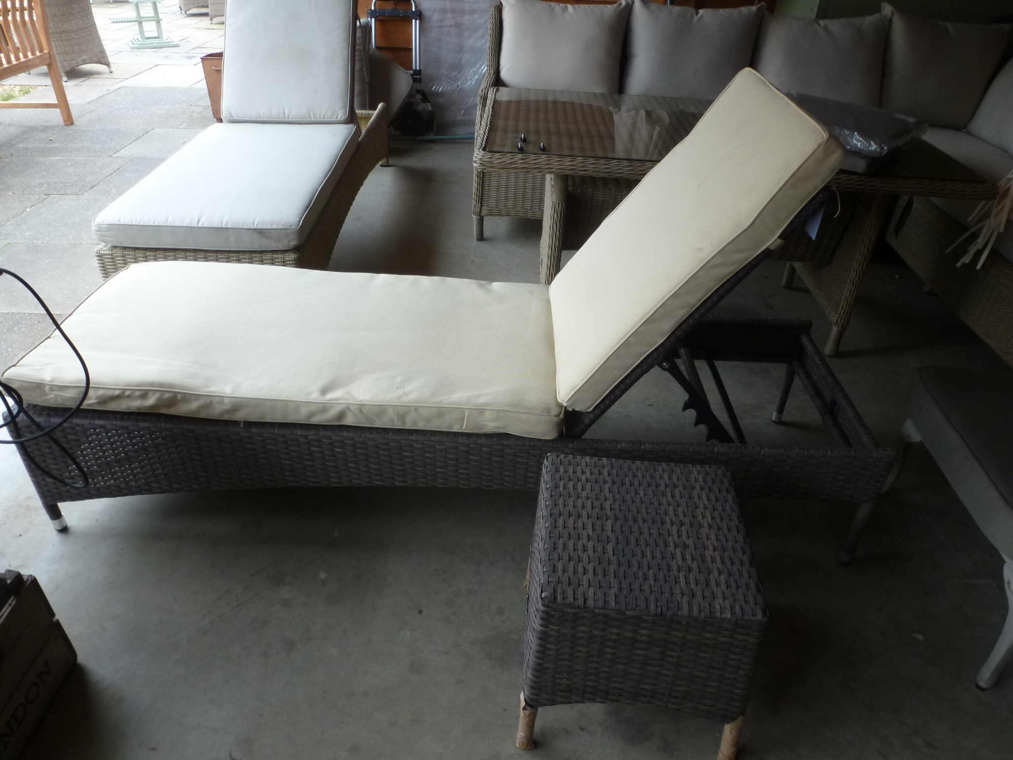 A Bramblecrest Rio lounger with coffee table