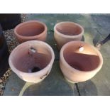 Four terracotta pots - diameter 30cm