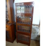 A Globe Wernicke "Classic" mahogany four section stacking bookcase with leaded glass fronts -