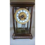 A brass four glass mantle clock with a Japy Freres striking movement - Height 28cm - spring missing