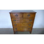 A 19th century mahogany chest with two short over three long drawers on bracket feet - Height 110cm