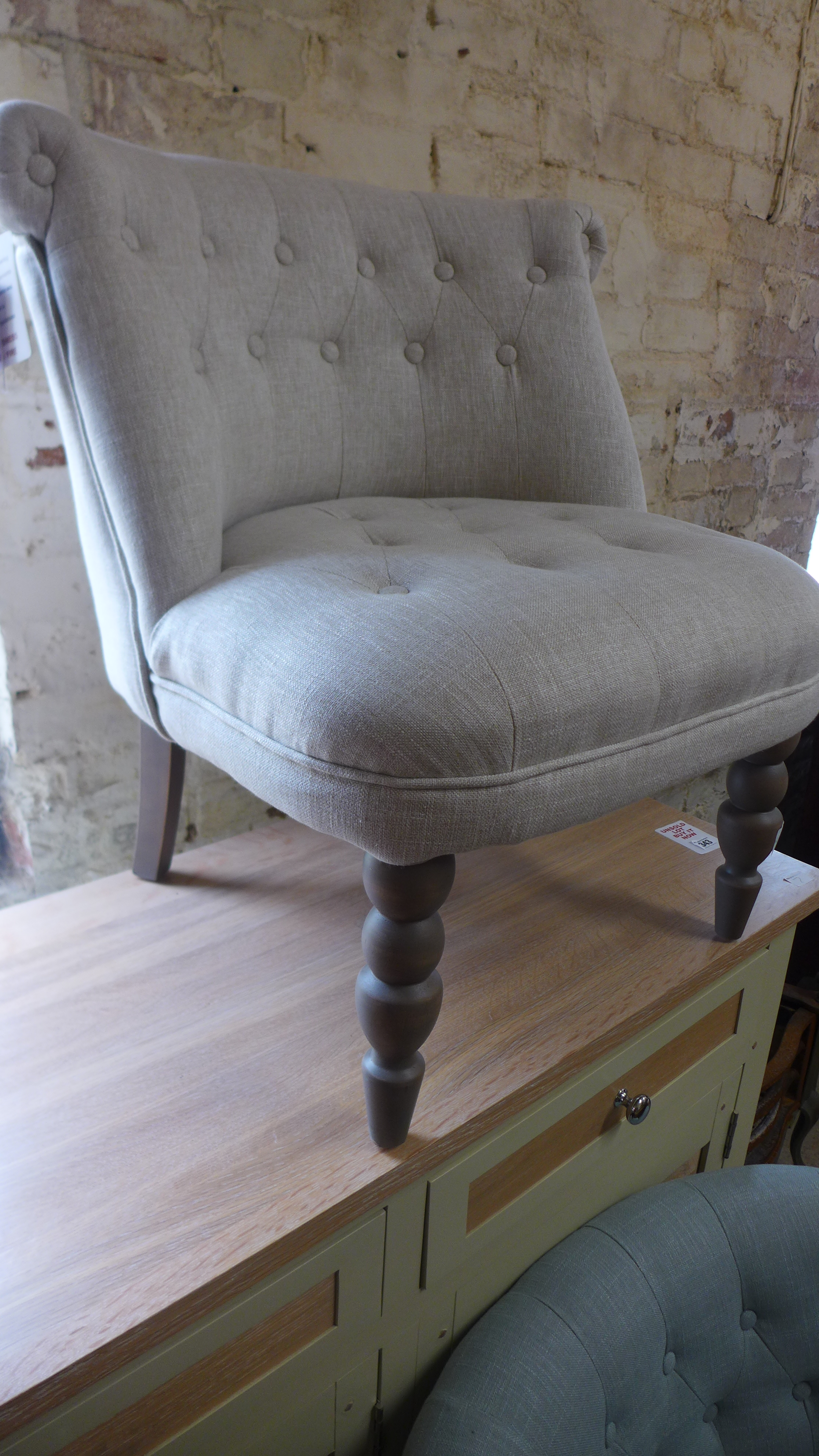 A new good quality upholstered bedroom chair