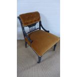 An ebonised late Victorian nursing chair