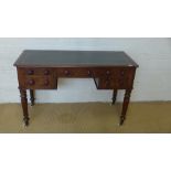 A 19th century mahogany side table with a leather inset top above five drawers one stamped Heal &