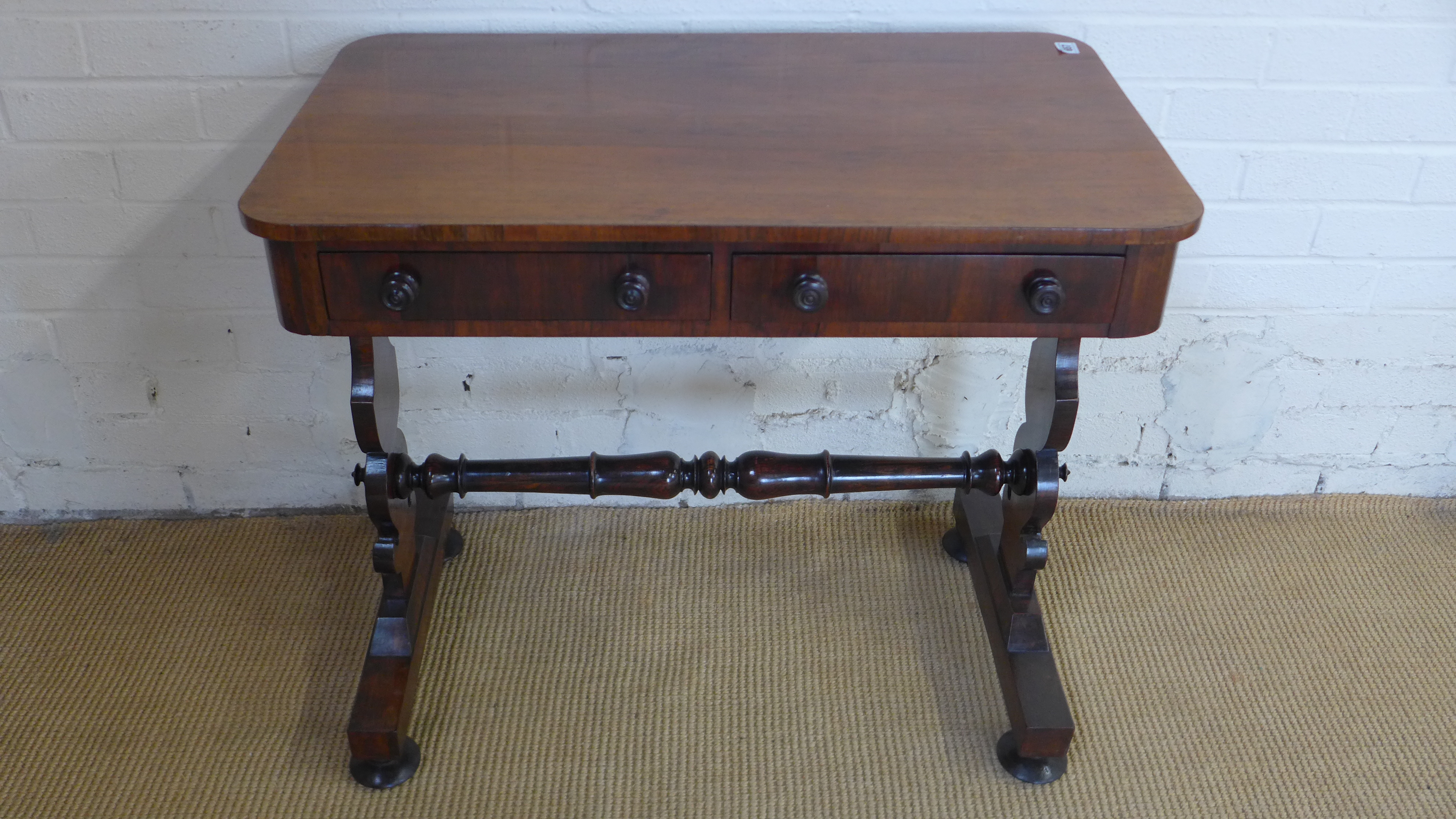 A 19th century rosewood stretcher table with two frieze drawers on shaped supports - Height 72cm x