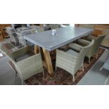 A Bramblecrest garden table with teak legs and replacement top 240cm long with six armchairs