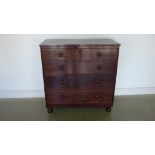 A Georgian mahogany and crossbanded two over three chest of drawers - 194cm x 46cm x 107cm