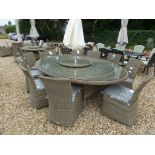 A Bramblecrest Sahara 250cm x 175cm table with lazy susan, ten side chairs,