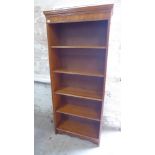 A reproduction yew-wood tall open bookcase with adjustable shelves - Height 180cm x 76cm x 31cm
