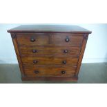 A 19th century mahogany chest with two short over three long drawers on a plinth base with oak