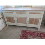 A modern Shaker style painted sideboard with three drawers and three cupboard doors - Height 97cm x