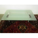 A CAILLERES glass coffee table - Height 30cm x 130cm x 80cm