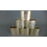 A good set of six heavy silver napkin rings with hammered finish London 1991 maker AMN - total