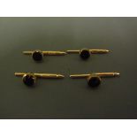 A set of four 14ct yellow gold shirt studs - Weight approx.