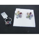 A 9ct white gold multi gem dress ring size J - approx weight 2.