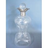 A silver topped decanter - good condition - Height 28cm