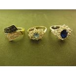 Three 9ct gold dress rings - sizes L,M,P - Weight approx.