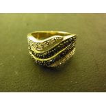 A 9ct gold dress ring - Size P - Weight approx. 4.