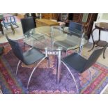 A Swedish glass and chrome extending table with four chairs - 115cm x 115cm extended