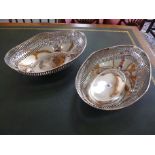 A pair of plated pierced dishes