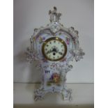 An ornate china mantle clock - Height 34cm - no key,