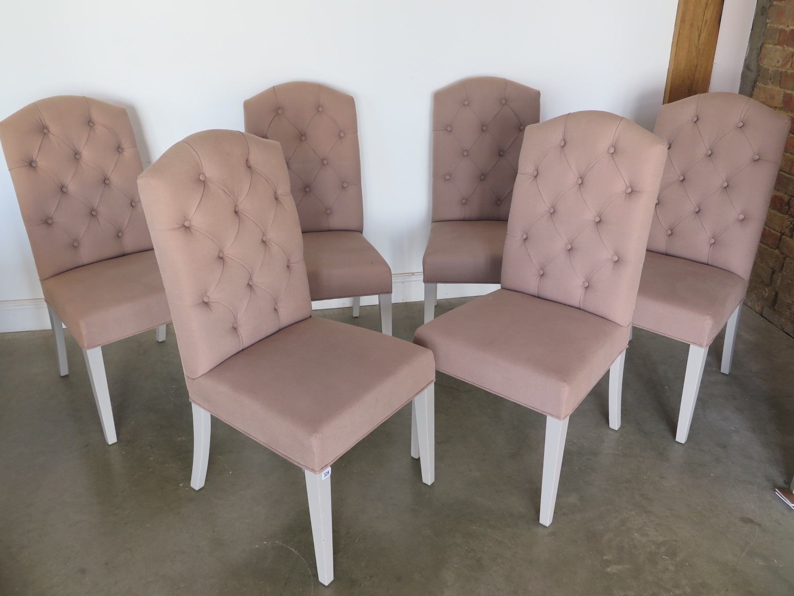 A set of six Bramblecrest button back fabric dining chairs