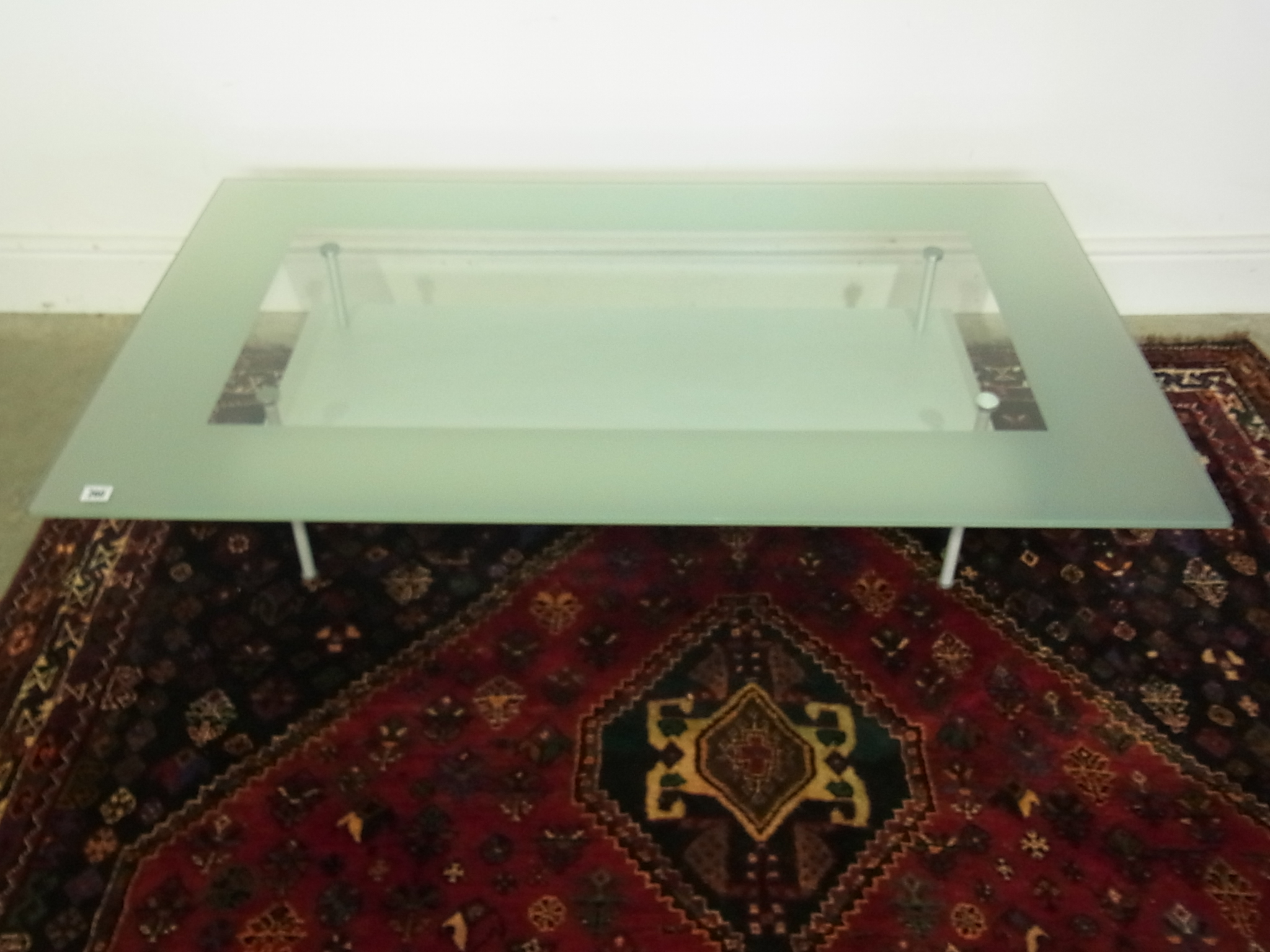 A CAILLERES glass coffee table - Height 30cm x 130cm x 80cm