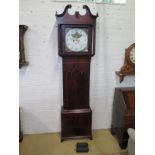 A Georgian mahogany eight day longcase clock with a painted 14" dial with moon roller and calendar