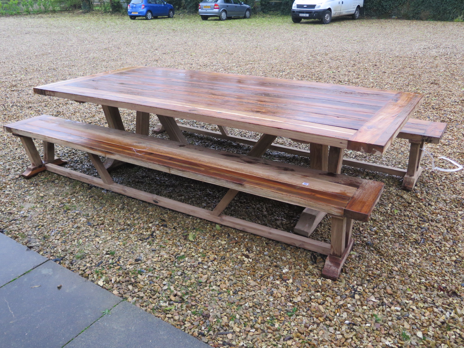 A Bramblecrest Kuta 240cm table with two benches