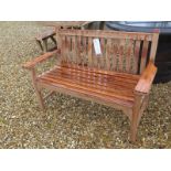 A Bramblecrest two seater curved back bench