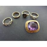 Four 9ct yellow gold rings - stone missing to one - Weight approx.