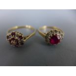 A 9ct yellow gold ruby and diamond cluster ring - size S and a 9ct yellow gold ruby and diamond