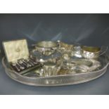 A selection of silver plated items including an oval tray with pierced gallery, sugar bowl,