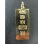 A 9ct yellow gold troy oz ingot - approx weight 31 grams - clean condition,