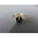 A 9ct yellow gold sapphire and diamond dress ring size P - approx weight 2.